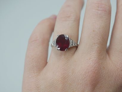 null 18k white gold and platinum ring set with a ruby probably treated of about 3cts...