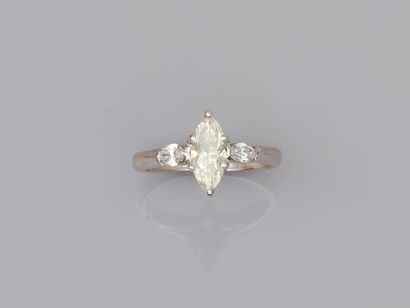 null 18k white gold ring set with a 1ct marquise-cut diamond and two marquise-cut...