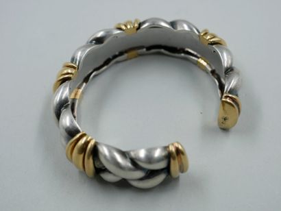 null OJ PERRIN.

Bracelet in braided silver and 18k yellow gold.

Signed and numbered....