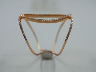 null Ring in 18k pink gold formed by lines of diamonds set with a scroll pattern....