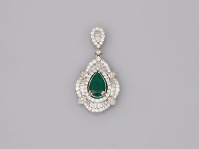 null 18k white gold pendant centered on a pear-shaped emerald set with a line of...