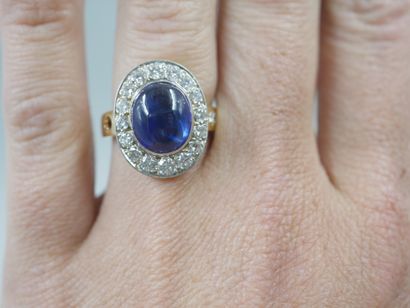 null 
18k yellow gold ring surmounted by a cabochon sapphire of approximately 7cts...
