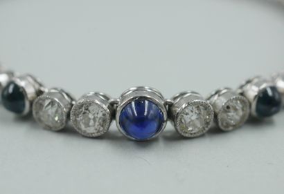 null Flexible bracelet in platinum and 18k white gold decorated with three cabochons...
