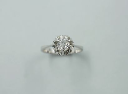 null Solitaire ring in 18k white gold with a 0.70ct old cut diamond in a hemmed setting....