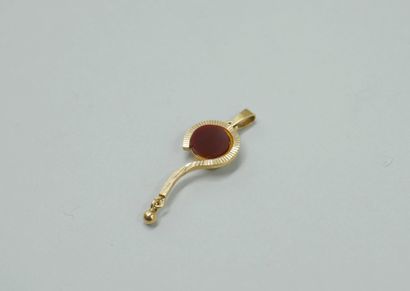 null Pendentif en or jaune 18k en forme de point d'interrogation serti d'une pierre...