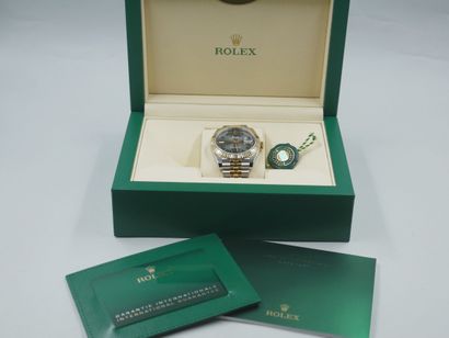 null 
ROLEX OYSTER PERPETUAL DATE JUST.

Men's watch in steel and 18k yellow gold....