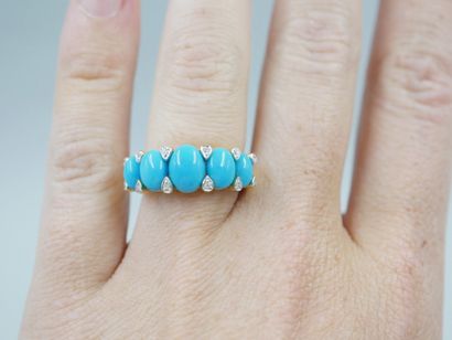 null 18k yellow gold band ring set with five cabochons of turquoise punctuated with...