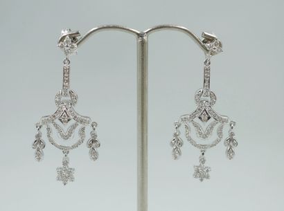 null Pair of 18k white gold earrings with girandoles and pendants entirely set with...