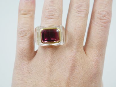 null Ring with cut crystal setting set with an emerald-cut rhodolite of about 8cts...