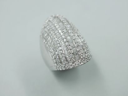 null 18k white gold dome ring set with lines of brilliant-cut diamonds interspersed...