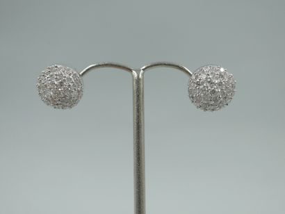 Pair of spherical earrings in 18k white gold...