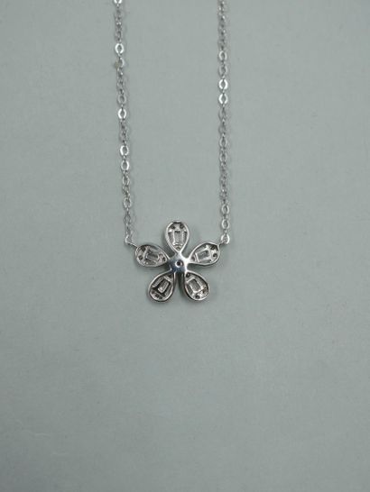 null Flower necklace in 18k white gold holding a flower set with brilliant-cut and...