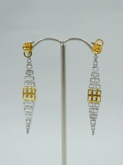 null Pair of 18k white and yellow gold drapery earrings with openwork diamond shapes...