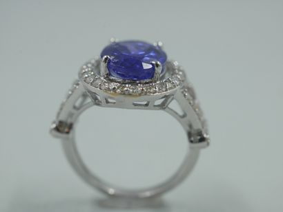 null 18k white gold ring set with an oval tanzanite of about 4cts in a diamond setting....