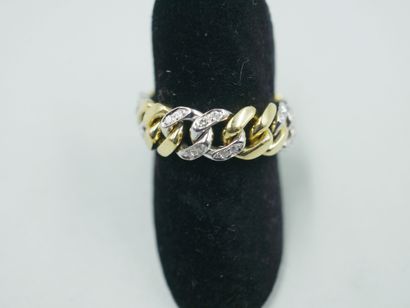null 18k yellow and white gold soft ring, the white gold links set with diamonds....