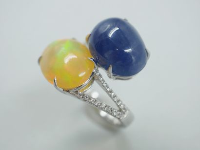 null Vous Moi ring in 18k white gold set with a 5cts opal and a cabochon sapphire...
