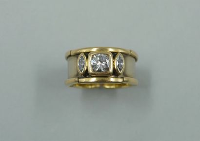 null MARINA BAY.

Yellow gold and 18k white gold ring set with a central diamond...