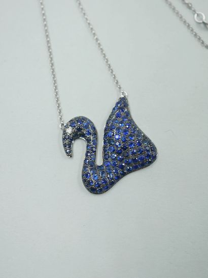 null Necklace in 18k white gold with a swan paved with sapphires, the eye set with...