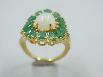 null Flower ring in vermeil centered of an oval opal in cabochon in a frame of pear...
