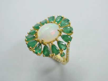 null Flower ring in vermeil centered of an oval opal in cabochon in a frame of pear...