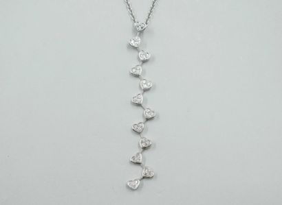 null Necklace in 18k white gold adorned with a pendant fall of hearts paved with...