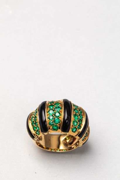 18k yellow gold ring paved with emeralds...