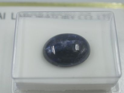 null Stone on paper: natural Burmese sapphire in cabochon weighing 20.94cts. 

Accompanied...