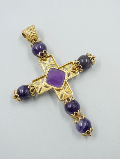 null Openwork 18k yellow gold cross with a faceted amethyst in the center and amethyst...
