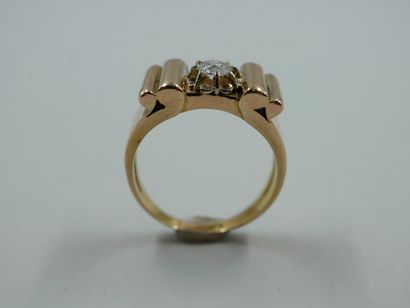 null Tank ring in 18k yellow gold with a 0.30ct diamond in the center. 

Work of...