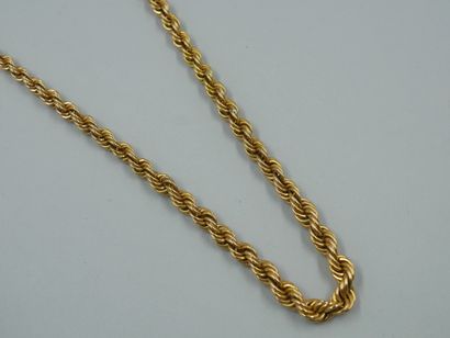 null Parure composée d'un collier et d'un bracelet en or jaune torsadé 18k. 

Poids...