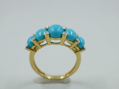 null 18k yellow gold band ring set with five cabochons of turquoise punctuated with...