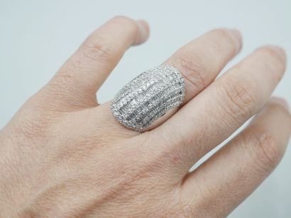 null 18k white gold dome ring set with lines of brilliant-cut diamonds interspersed...