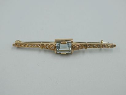 null Yellow and 14k white gold barrette brooch topped with an emerald-cut aquamarine...