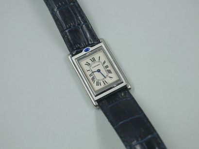 null 
CASE, TILTING TANK

Steel watch with rectangular case set with a sapphire in...