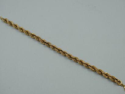 null Parure composée d'un collier et d'un bracelet en or jaune torsadé 18k. 

Poids...