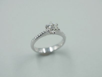 null Solitaire ring in 18k white gold set with a 1ct diamond of H color and SI2 clarity...