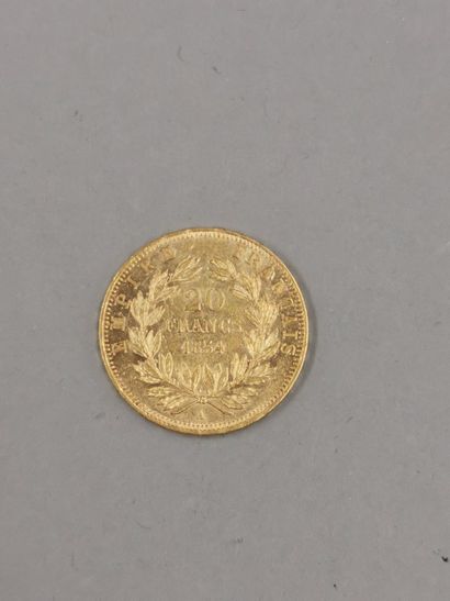 null 20 francs gold coin Napoleon III, 1854. 

Weight : 6,40gr