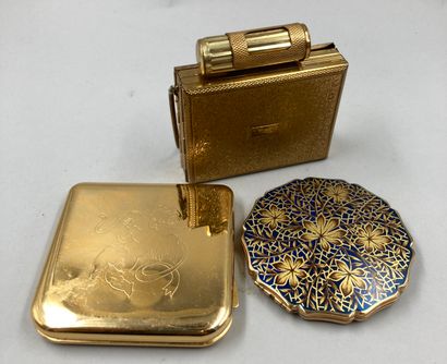 null LANCOME

Lot including: a compact powder box, sealed, a golden enamelled powder...