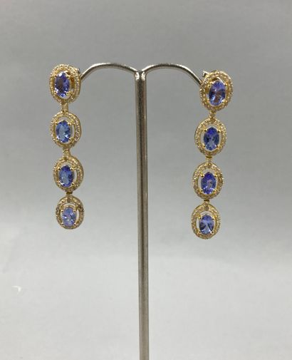null Pair of 9k gold and vermeil earrings with openwork tanzanites surrounded by...