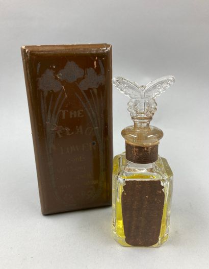THE FLAG FLOWER

Glass bottle with butterfly-shaped...