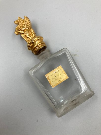 null GHYSKA " All the flowers

Rectangular bottle of flared form, stylized gilded...