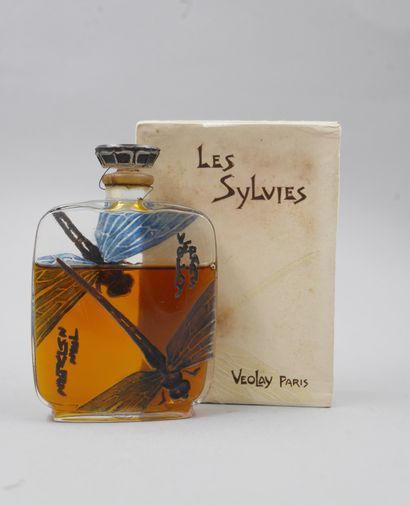  VEOLAY "Les Sylvies 
Glass bottle, pressed molded, body of rectangular form with...