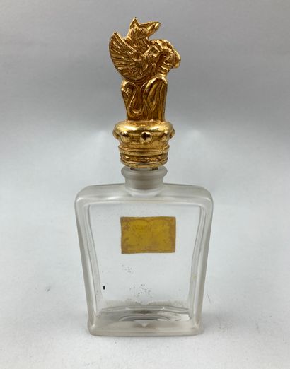 null GHYSKA " All the flowers

Rectangular bottle of flared form, stylized gilded...