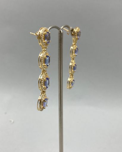 null Pair of 9k gold and vermeil earrings with openwork tanzanites surrounded by...