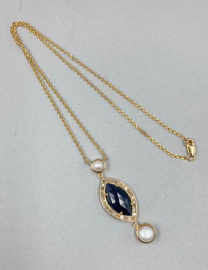 null Necklace in vermeil and its pendant adorned with a root of sapphire in claw...