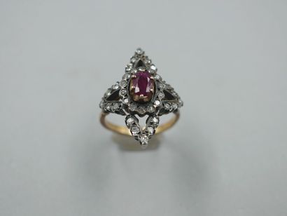 null 18k yellow gold and silver marquise ring centered on a ruby in a star-shaped...