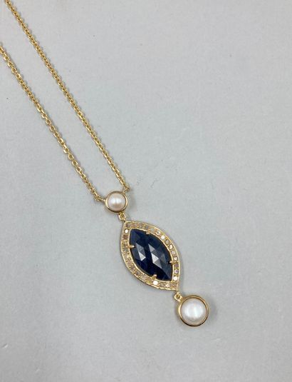 null Necklace in vermeil and its pendant adorned with a root of sapphire in claw...