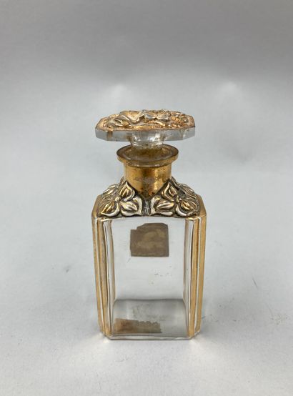 null CHRISTIANNE DE JUNIANNE

Glass bottle of rectangular form, shoulder decorated...