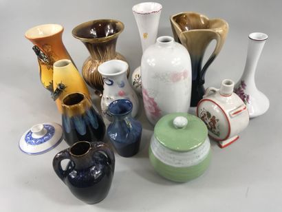 null Lot of ceramics including 12 small vases of which Moustiers and a covered pot....