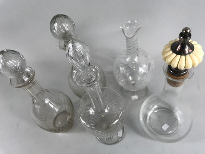 null Set of five carafes in cut glass, one of which has a godronné stopper in re...